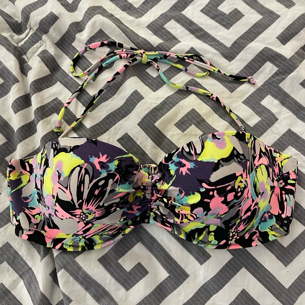 Victoria’s Secret multi-color bikini top, size 34C. Only worn a couple times.